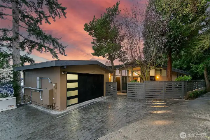 The front of the home showing off the driveway and extra parking.