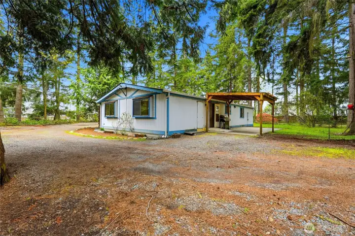 Over 1 acre of usable, tree-lined land