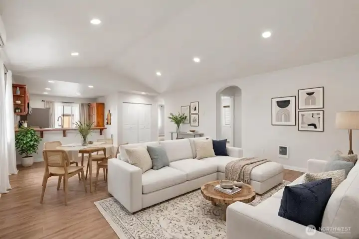 Open living space connected to dining area ( Virtually Staged )