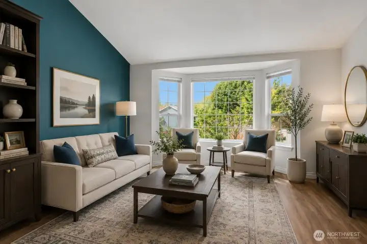 Virtually staged to illustrate potential use as a formal living room or sitting area. Virtually staged to illustrate potential use as a formal living room or sitting area.
