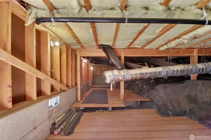 Rare stand-up crawl space offering easy access and tons of storage space Rare stand-up crawl space offering easy access and tons of storage space