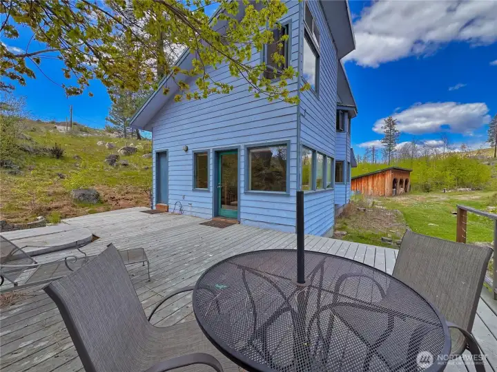 Outdoor living space with composite deck is perfect for relaxing amidst ultimate seclusion