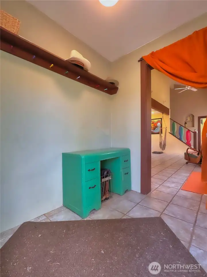 Generous mudroom entry designed for easy organization, with plenty of space for coats, gear, and daily essentials