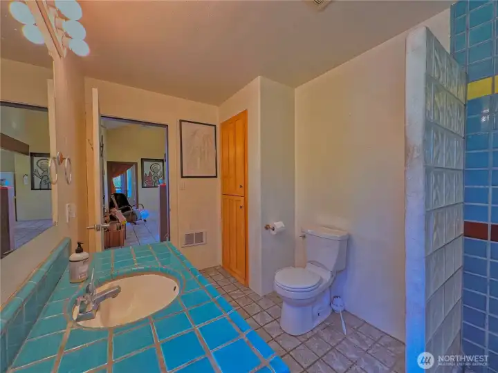 ¾ bath with convenient exterior access to the deck and hot tub