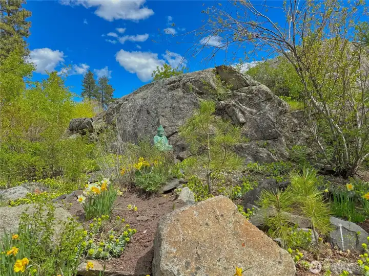 Dramatic rock outcroppings enhance the property’s natural landscape with striking texture and visual interest