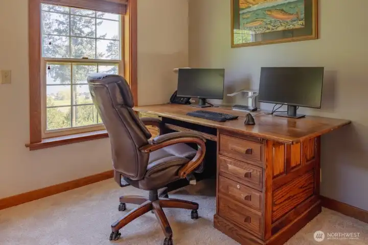 Third of three upstairs bedrooms used as an office.
