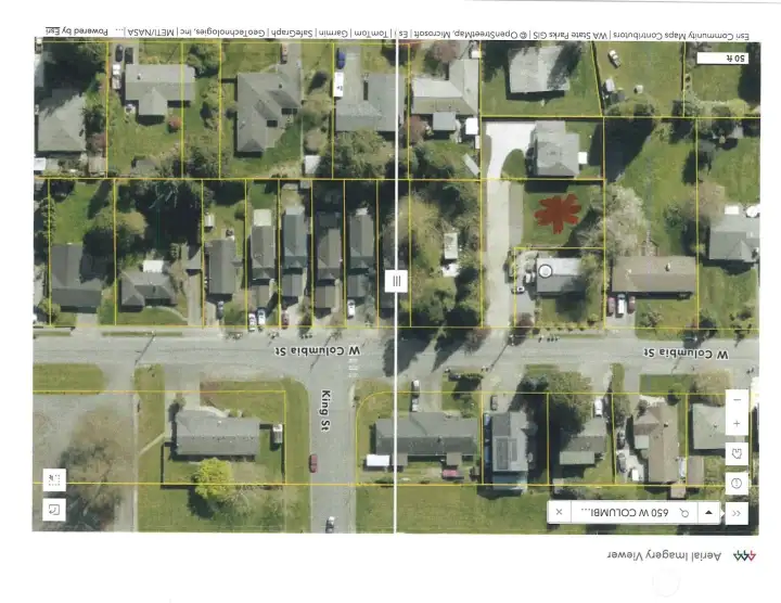 Aerial view of the site.  Red Asterisk marks the 63' by 112' lot + easement area.