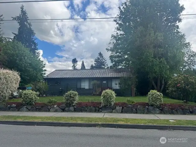 This home is the original 1960 home on the site, was remodeled after short plat was completed.