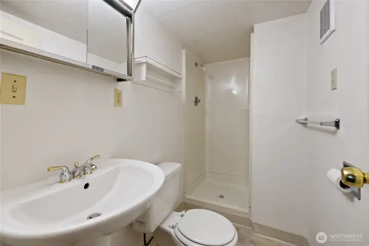 This basement 3/4 bathroom is perfectly located for use of the downstairs family room. With one bathroom per floor, this home is highly functional! This basement 3/4 bathroom is perfectly located for use of the downstairs family room. With one bathroom per floor, this home is highly functional!