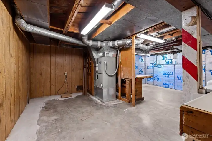 This unfinished half basement area hosts the central heating, water tank, and w/d. This is a large and convenient storage area. The detached 2 car garage features more storage if needed. This unfinished half basement area hosts the central heating, water tank, and w/d. This is a large and convenient storage area. The detached 2 car garage features more storage if needed.
