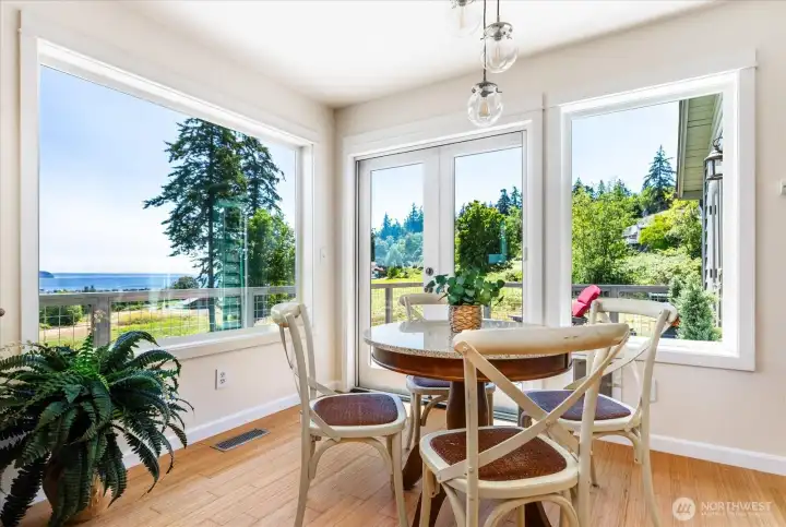 Views from the eat in kitchen with french doors out to the new deck Views from the eat in kitchen with french doors out to the new deck