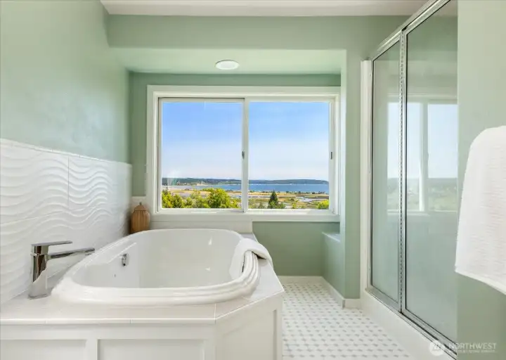 Soak in your roomy tub and take in the views Soak in your roomy tub and take in the views