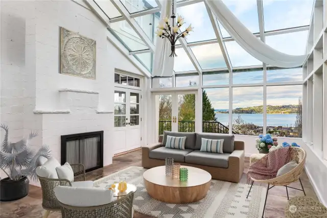 The glass sunroom was added sometime in the 80s. It is a flex space that can be dressed up or down to suit personal needs
