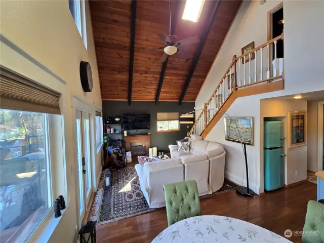 View of living room from dining room space.