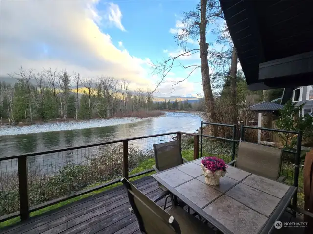 Upriver view. Clouds are covering the mountains.