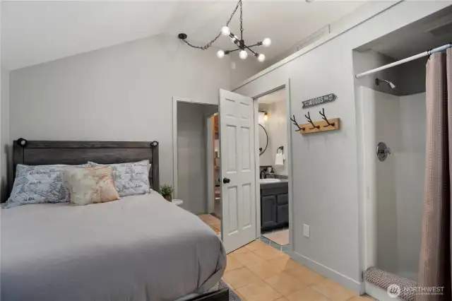 First bedroom with 3/4 bath & Loft storage