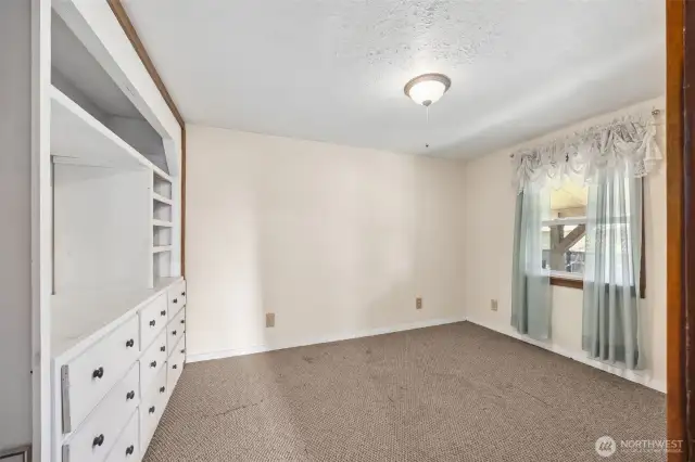 Bedroom #2 on main floor with built ins.