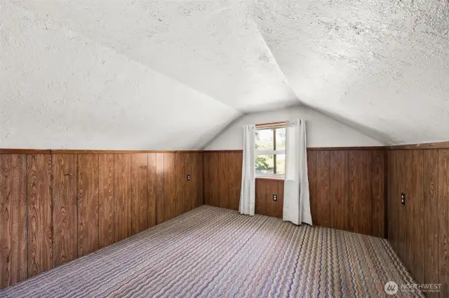 Upstairs additional room offers a great place for exercise room, play room or hobbies.