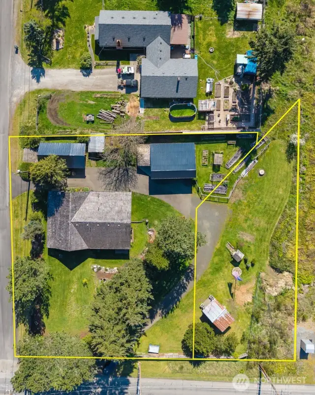 Two parcels equal .77 acres on a flat corner lot.