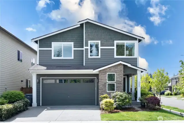 Corner lot: newly painted. 2 car garage, driveway, free street parking