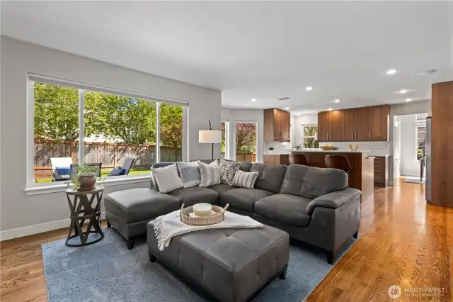 Kitchen and family room open to spacious back yard.
