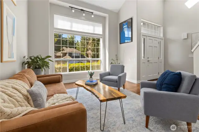 Soaring ceilings and beautiful picture window in the Living Room