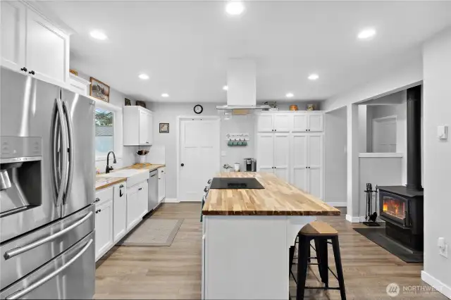 to the right you will find 2 bedrooms and a full bath.