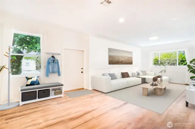 Step into this open floor concept living area with large, light-filled windows.