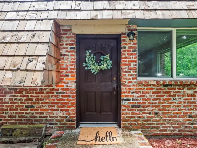 Charming touches from the brick to wood features like the solid wood front doors, the cascading cedar shake roofing. When you mix this many natural elements you begin to feel calm.