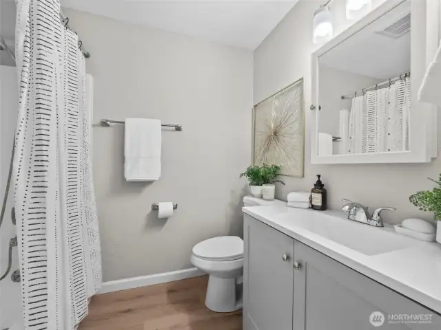 The bathroom for this unit has been fully updated with neutral colors and tones.