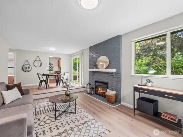 The back unit or unit two has been updated from the flooring, the paint, the ductless heat and ac systems, windows, kitchen with new fireplace.