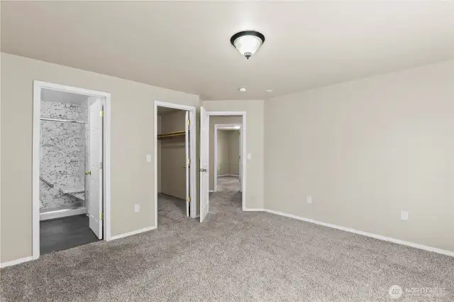 Primary bedroom, closet and bathroom.