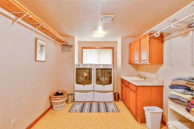 Large laundry room. Washer and dryer are included