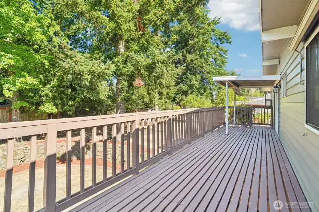 Back deck overlooking ample back yard.