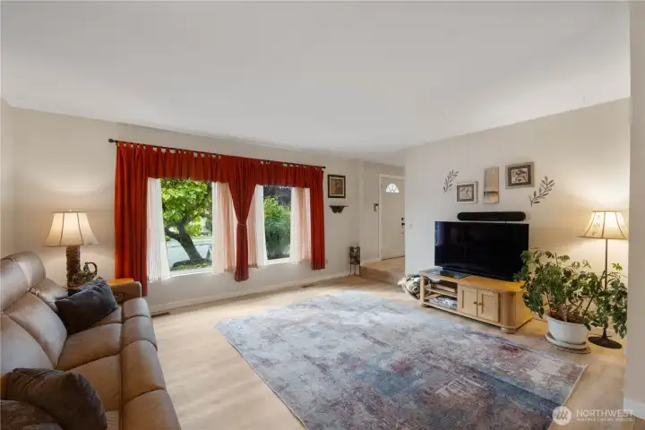 This living room is perfect for entertaining, relaxing with family or simply enjoying the open feel of the space.  Windows were updated in 2009-