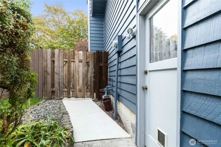 The door to the right is from/to garage.  The sidewalk path was recently re-done.