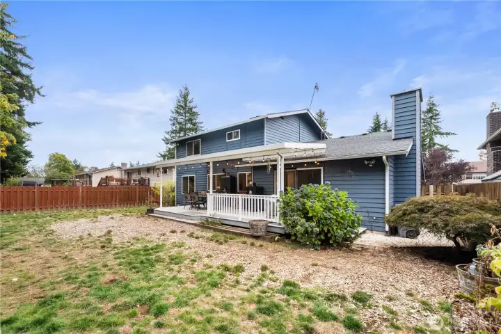 look at that large Deck!  A great place for entertaining Even in our rainy-er days, as the cover will shellter you.