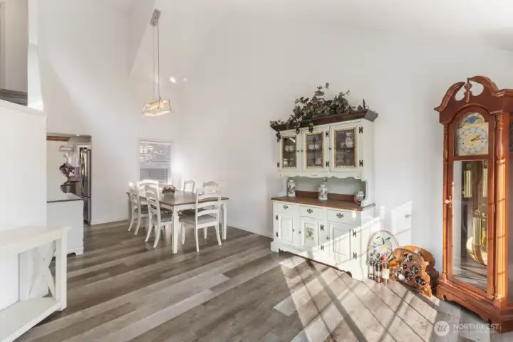 the front room extends into a spacious dining area