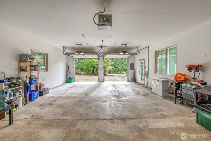An EV charger pictured on the right by the entry door.