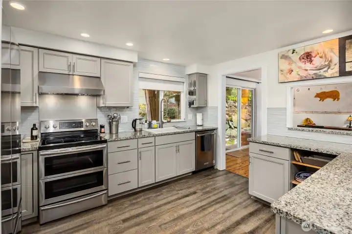 Upgraded kitchen with new Kohler super-wide sink and new Kohler water tap