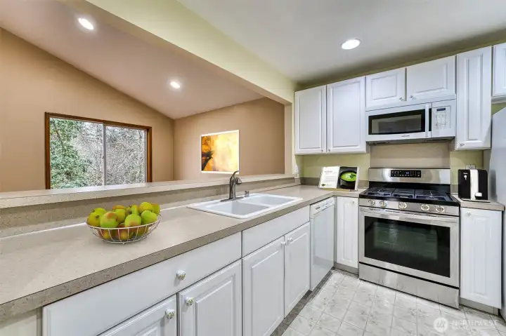 Plenty of countertop space! Virtually Staged.