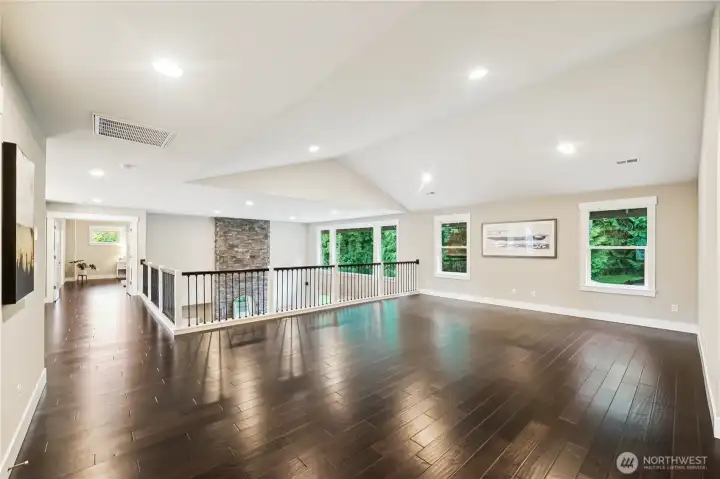 Beautiful hardwood floors...carpet only in the guest bedrooms upstairs