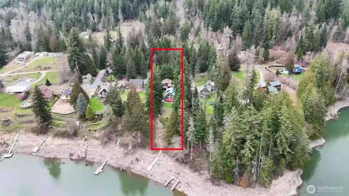 Aerial with ESTIMATED lot lines outlined. Lakefront is deeded to TPU but currently maintained by property owner.