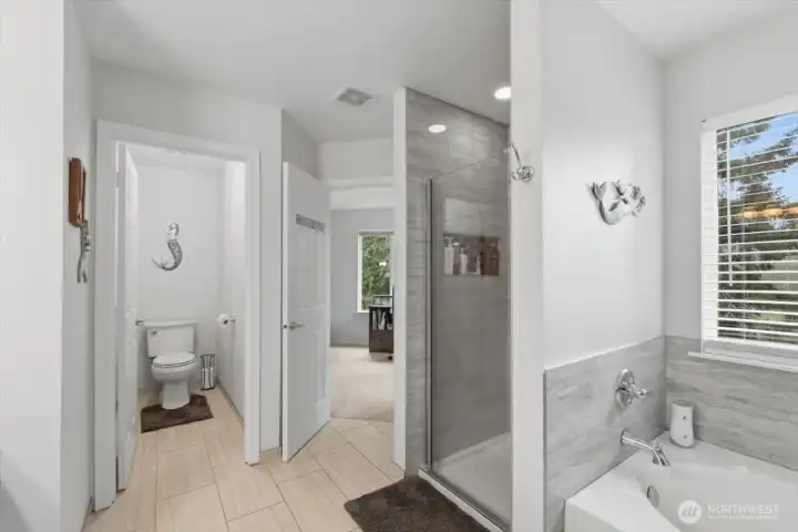 Opposite view of the primary bathroom.