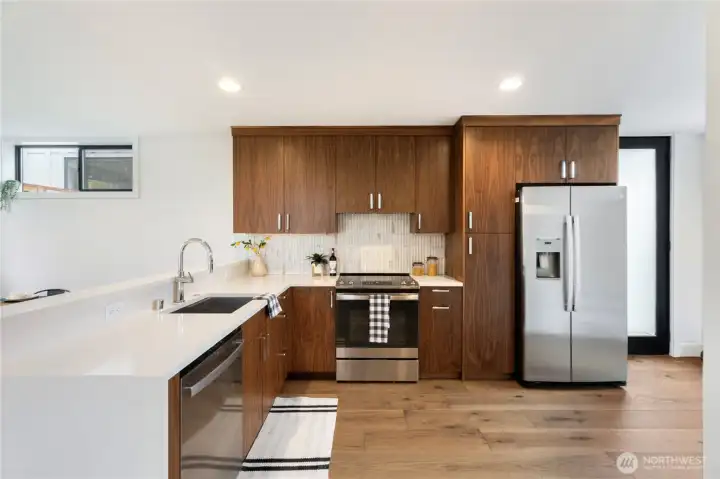 Large, open kitchen with bar seating
