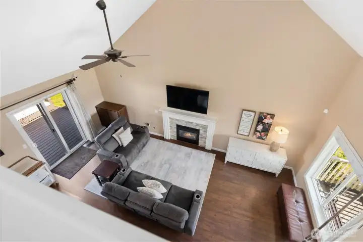 Looking down from the upstairs landing you can see how light this room is.