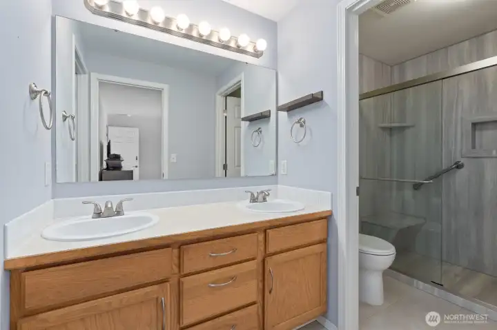 Primary bath with that newer shower and toilet.