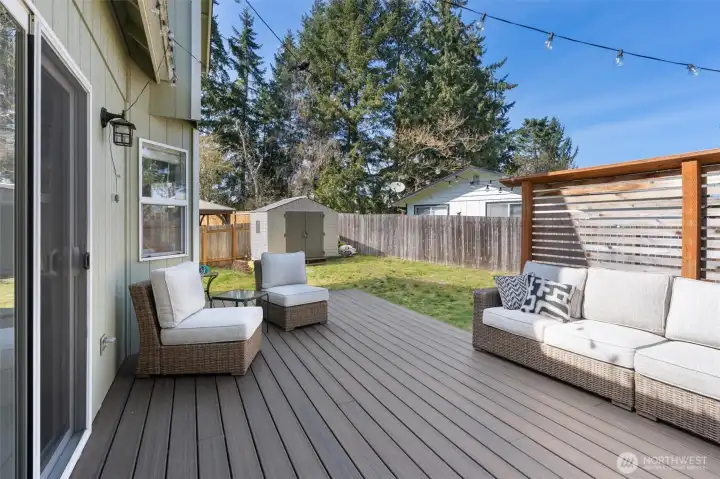 Now lets go outside and enjoy this beautiful new composite deck.  Also, there is a small shed that stays with the property.