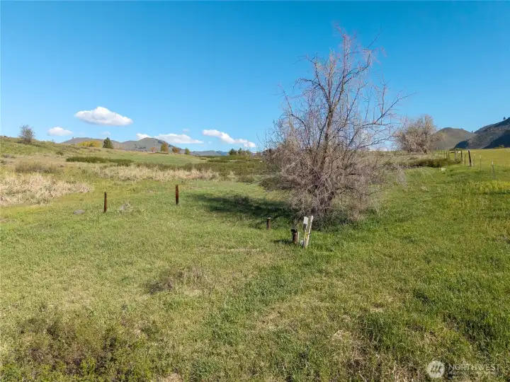 A solid-producing well is already in place, power runs along the road, and a private septic system will be needed.