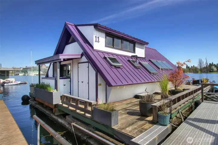 Because of their vertical pitch, A-Frame designs usually span 1.5 to 2 stories, positioning a cozy master bedroom or sleeping loft beneath the high rafters, accessed by a sturdy ladder. This home was designed with a dormer to expand the space in the loft/sleeping area.